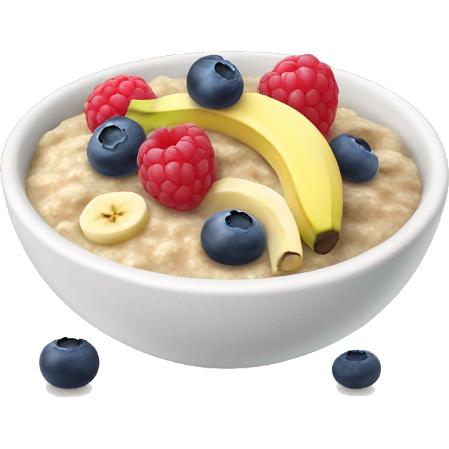 Breakfast oat porridge with banana, blueberries and raspberries
