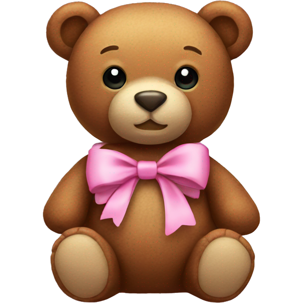 Stuffed bear wearing a pink bow