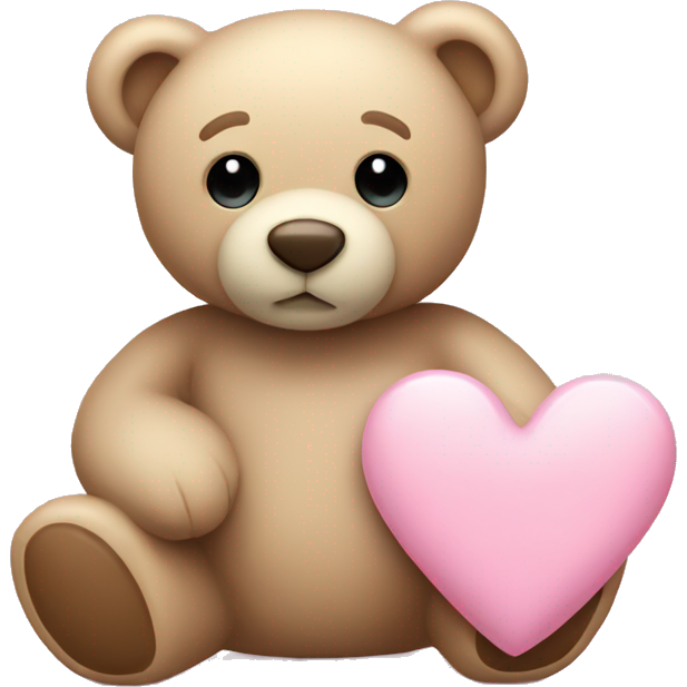 Beige teddy bear and a pink pastel heart